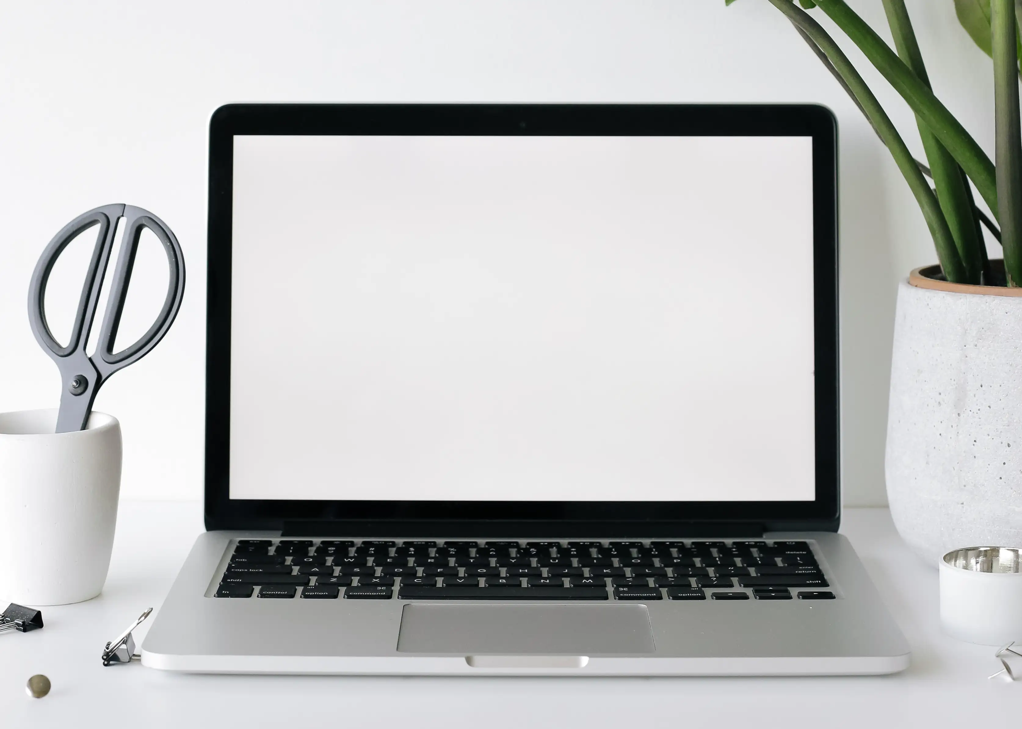 A laptop on a desk ready for an online lesson